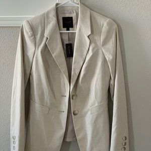 The limited cream color blazer new with tag